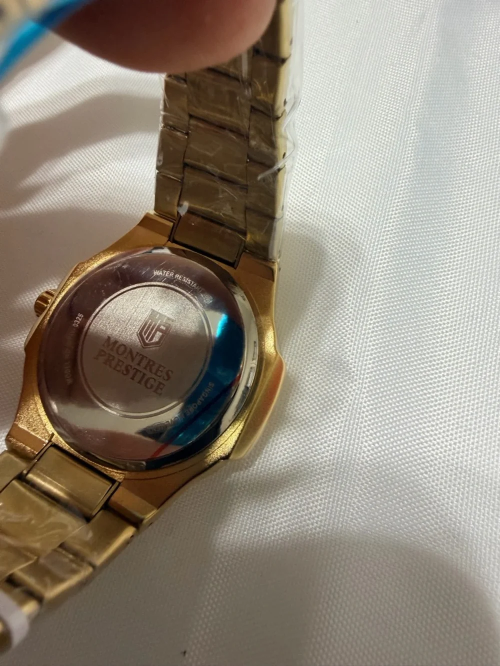 Montres Prestige by Invicta. Gold Tone Men's Bracelet Watch with Crystal Bezel